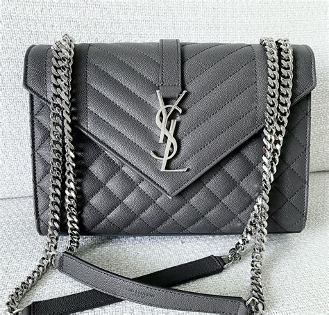 gray ysl purse|YSL black and white bag.